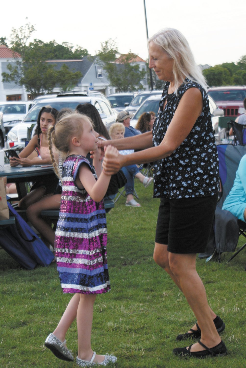 GROOVING TO TUNES: Seven-year-old Giovanna McKay enjoyed many dances with her grandmother Catherine Lonardo.